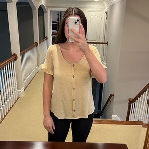 Striped top with ruffle sleeves and button front